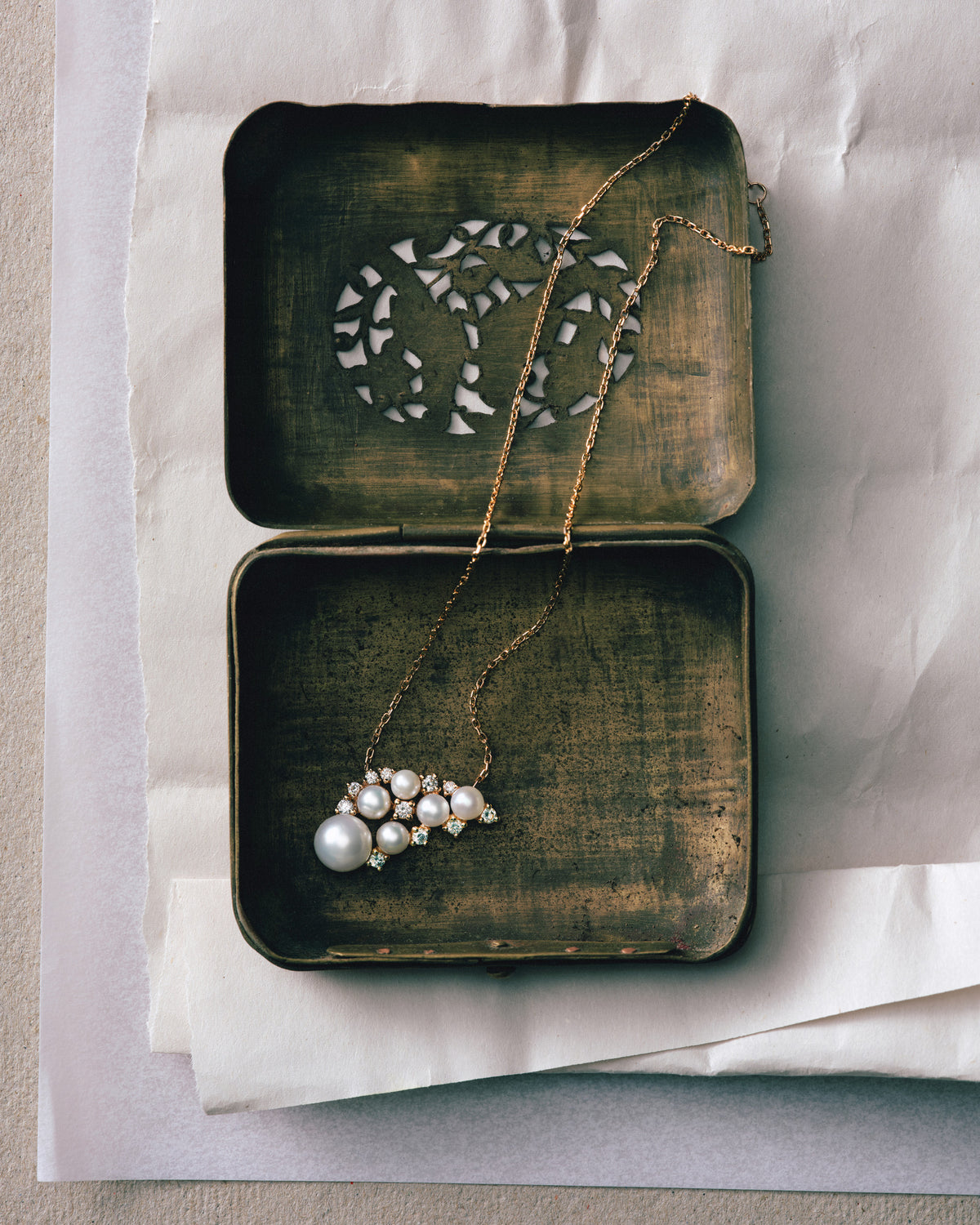 Pearl Wing Pendant, worn