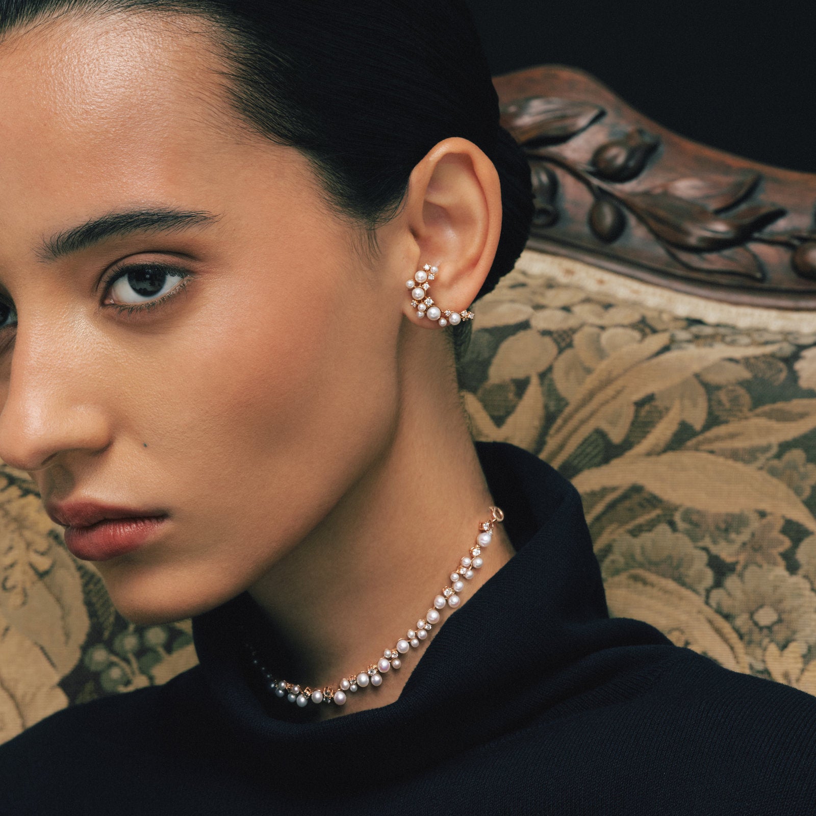 Model wearing the Pearl C-Shape Earrings and Pearl Cluster Necklace