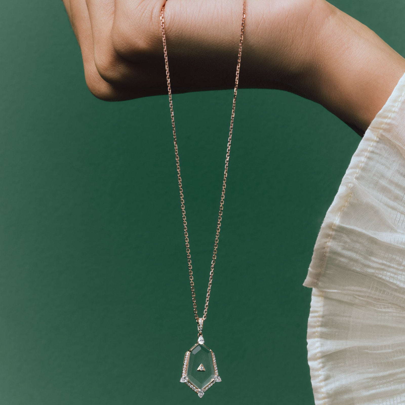 Crystal Prisme Statement Pendant held in the hand